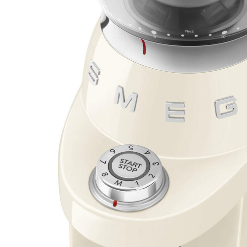 Кофемолка SMEG, стиль 50-х г.г., 15 уровней помола, конические жернова, объем контейнера для кофе 240 г, цвет сталь Кофемолка SMEG, стиль 50-х г.г., 15 уровней помола, конические жернова, объем контейнера для кофе 240 г, цвет сталь